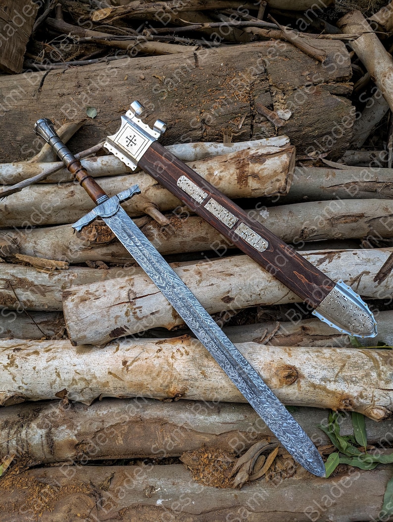 Angled view of a handcrafted Damascus steel Knight Templar Sword with scabbard highlighting detailed craftsmanship