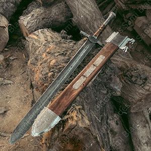 Angled view of a handcrafted Damascus steel Knight Templar Sword with scabbard highlighting detailed craftsmanship