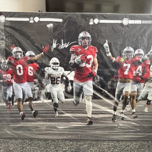 Póster fotográfico de Jack Sawyer capturando un balón suelto en seis intentos contra Texas Ohio State