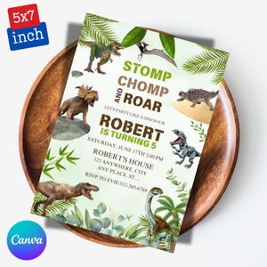 May include: A 5x7 inch invitation with a dinosaur theme. The invitation reads "Stomp, Chomp, and Roar" and "Robert is turning 5". The design includes illustrations of various dinosaurs and tropical foliage. The invitation is on a wooden tray.