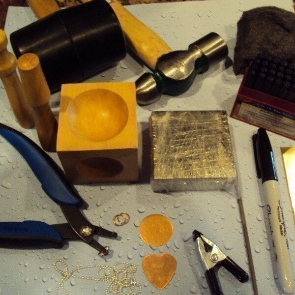 BASIC ECONOMY METAL JEWELRY STAMPING KIT lots of stuff in here INSTRUCTIONS - block hammers hole punch blanks - GREAT way to try it out GREAT VALUE AFFORDABLE COMPARE THE CONTENTS and PRICE OF THIS BASIC KIT