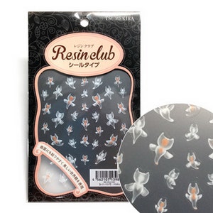 May include: A package of clear nail stickers with a design of white cats with orange accents. The package is black with pink accents and the text "Resin club" in Japanese and English.