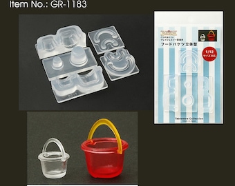 May include: A set of clear plastic molds for making miniature food items, including a bucket, a bowl, and a cup. The molds are labeled "Food Bucket 3D" and "1/12 Size Compatible".
