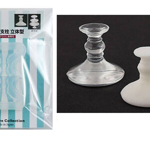 May include: A clear plastic mould for making two cake stands. The mould is in a clear plastic bag with the text "Clay Jewelry Time" and "Tableware Collection Made in Japan".
