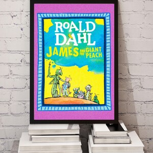May include: A framed print of the book cover for "Roald Dahl: James and the Giant Peach." The artwork features a vibrant illustration with the title in white and the author's name at the top. The frame is black, with a purple and blue border.
