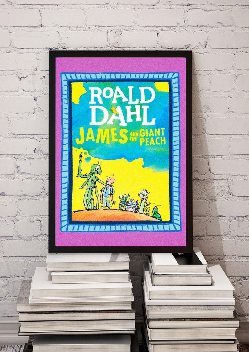 May include: A framed print of the book cover for "Roald Dahl: James and the Giant Peach." The artwork features a vibrant illustration with the title in white and the author's name at the top. The frame is black, with a purple and blue border.