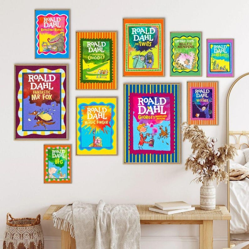 May include: A selection of framed Roald Dahl book covers, such as "Revolting Rhymes" and "The Twits." The illustrations are bright and colourful, with the author's name prominently displayed. The frames vary in colour, creating a visually appealing arrangement for a children's room or library.