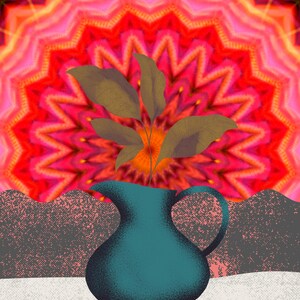May include: A teal blue ceramic jug with a wide mouth and a handle sits on a white surface. The jug is filled with a leafy green plant. The background is a red, orange, and yellow mandala pattern.