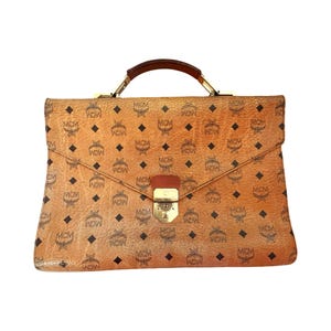 Cartera de cuero con logotipo MCM vintage de los años 70, maletín, asa superior, cierre de metal