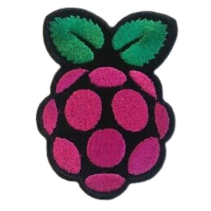 May include: Embroidered patch featuring a raspberry design. The patch has a black background with a pink raspberry and green leaves. The raspberry is made up of several pink circles.