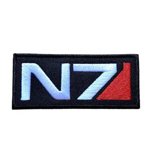 May include: A black embroidered patch with the white text "N7" and a red triangle.