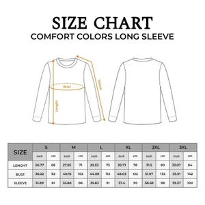 May include: Size chart for Comfort Colors long sleeve shirts. The chart includes measurements in inches and cm for length, bust, and sleeve for sizes S, M, L, XL, 2XL, and 3XL. The image shows front and back views of the shirt.
