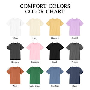 May include: A colour chart showcasing Comfort Colors t-shirts in various shades. The chart presents twelve colours: white, ivory, mustard, orchid, graphite, blossom, black, pepper, yam, light green, blue jean, and navy. The text "COMFORT COLORS COLOR CHART" is at the top.