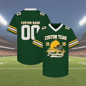 May include: Green football jersey with white and gold accents. Features the text "CUSTOM NAME" and the number "00" on the back. The front displays "CUSTOM TEAM 19 Football 19" with a helmet graphic.