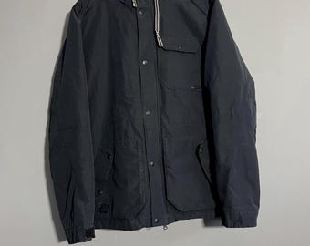 Oakley ブラック ジップアップジャケット Oakley Performance Fit Survival Multi Pocket Zipper Jacket Black