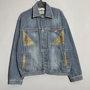 Vintage Levi’s Made In USA jeans jacket with leather details