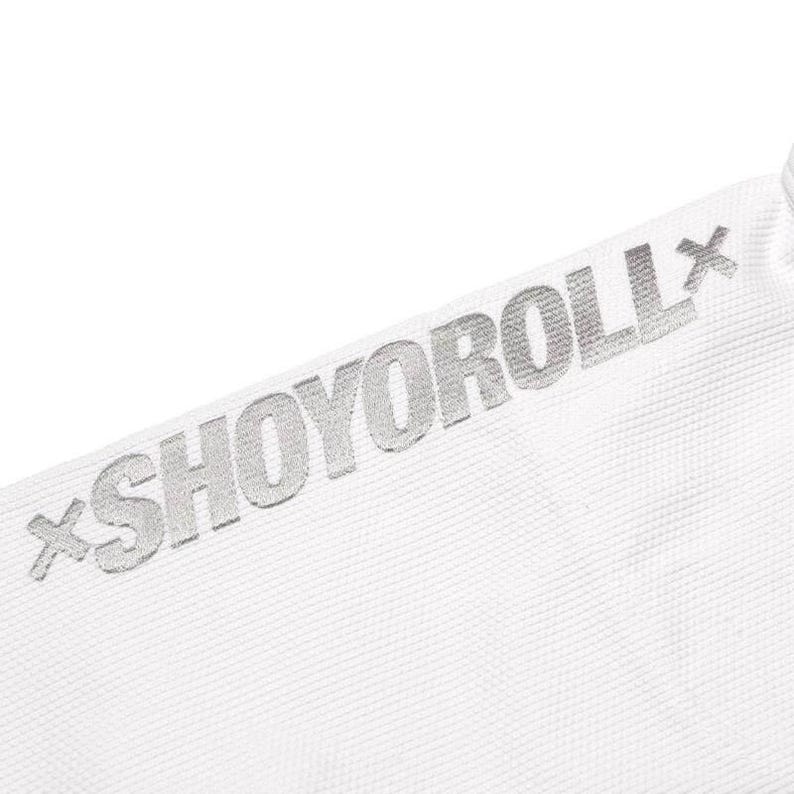 Shoyoroll Kimono free bag BJJ Gi Suit BJJ suit Suit Kimono 350 Kimono 450 GSM Free Belt Pearl weave color  stitch heavy reinforced seams inner taping patches canvas pants juddu suit juddu 450 GSM jiujitsu  Embroidery Brazilian jiujitsu  Bjj Kimono  Bjj Gear Active Wear Shoyoroll BJJ Gi Brazilian Jiu Jitsu Gi BJJ Gi for Sale Limited Edition BJJ Gi Premium BJJ Kimono Jiu Jitsu Uniform Lightweight BJJ Gi Shoyoroll Kimono Competition BJJ Gi Shoyoroll gi sale Origional Shoyoroll gi Shoyoroll RVCA Gi