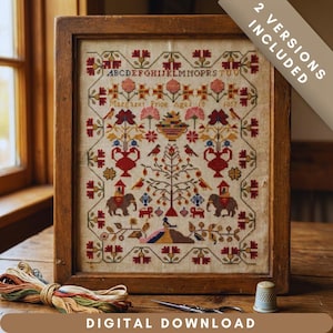 May include: A framed cross-stitch sampler with a detailed floral and animal design in red, yellow, and green. The sampler includes the alphabet, the name "Margaret Price", and the year 1857. The frame is made of wood. The words "2 VERSIONS INCLUDED" and "DIGITAL DOWNLOAD" are also visible.
