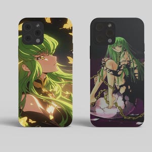May include: Two phone cases featuring anime-style illustrations. One case displays a woman with long green hair, looking upwards with a golden butterfly background. The other case shows a woman with green hair, chained and sitting on a cracked egg.