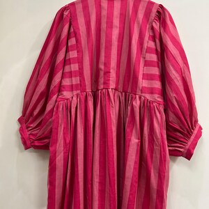 Sustainable handmade fashion pink striped midi dress.