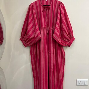 Pink striped pure cotton midi dress with balloon sleeves.