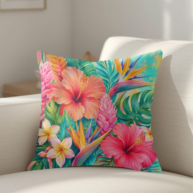 May include: A square throw pillow featuring a vibrant tropical print with large orange and pink hibiscus flowers, yellow plumeria blossoms, bird of paradise flowers, and various green palm leaves set against a bright turquoise background.