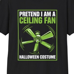 May include: A black short-sleeved t-shirt featuring a graphic print with the text "PRETEND I AM A CEILING FAN" and "HALLOWEEN COSTUME" in white and green. The central illustration depicts a green ceiling fan with motion lines on a black background.