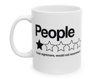 May include: White ceramic mug with the word "People" in bold black letters. Below the word are five stars, one filled in and four outlined. The text "Total nightmare, would not recommend" is below the stars.
