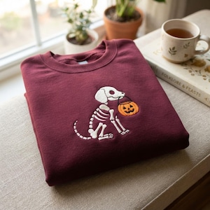 Skeleton Dog Embroidered Sweatshirt, Halloween Dog Shirt, Pumpkin Bucket Embroidery, Cute Spooky Fall Crewneck Gift