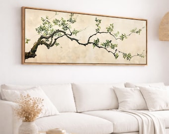 May include: A rectangular framed canvas art print featuring a detailed illustration of a tree branch with green leaves. The branch is dark brown against a beige background. The frame is a light brown color.
