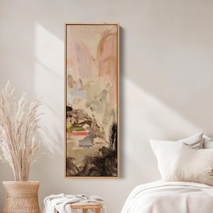 May include: Abstract art painting in a vertical rectangular format. The artwork features a blend of colors, including beige, pink, green, and black, within a light brown wooden frame. The painting's style is reminiscent of an impressionistic landscape.