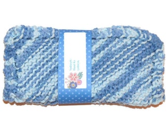 May include: Blue and white striped knitted dishcloth with a label that reads "Sydney's Hand Knits Sydney, NY"