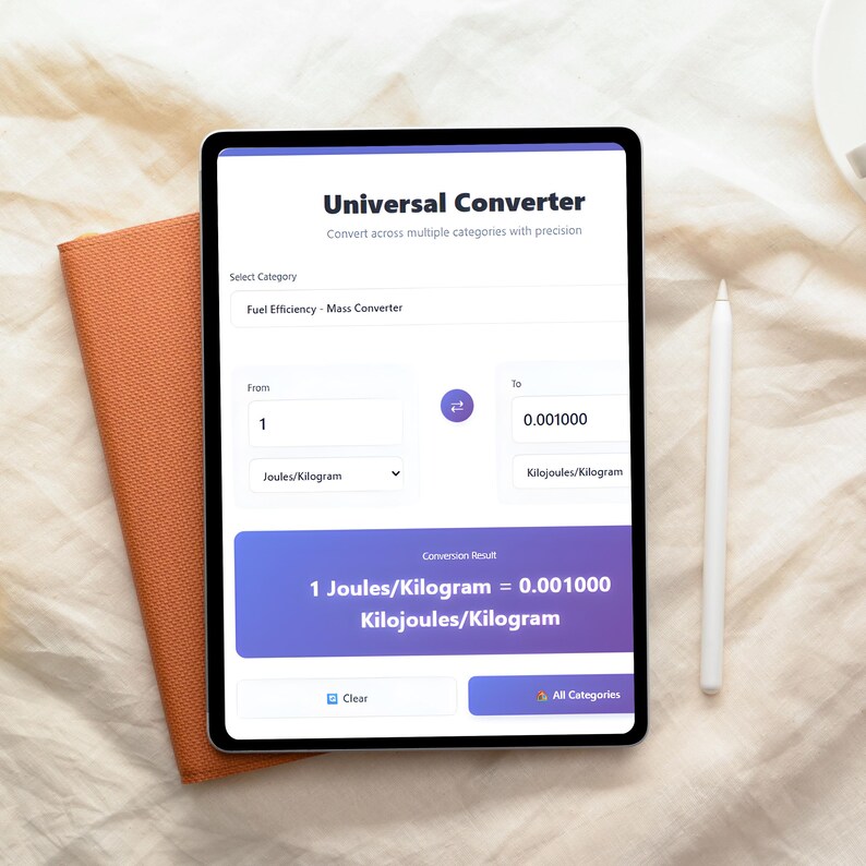 May include: A tablet displaying a "Universal Converter" app, converting Joules/Kilogram to Kilojoules/Kilogram. The screen shows the conversion result: 1 Joules/Kilogram = 0.001000 Kilojoules/Kilogram. An orange notebook and a white stylus are also visible.