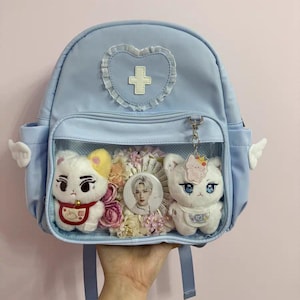 Angel Nurse Ita Backpack with Clear Display Window | Kawaii Plush Decor Anime Cosplay Bag | Medical-Themed Pin Bag for Collectors