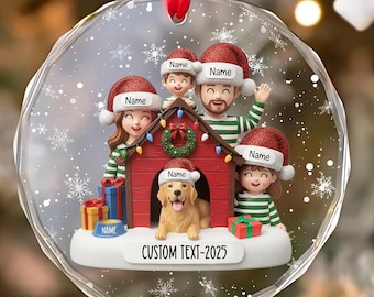 May include: A clear, round Christmas ornament with a red ribbon. The ornament features a family of four and a dog in a dog house, all wearing Santa hats. The text "Custom all dog breed" and "Custom Text-2025" are visible.