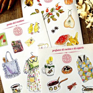 May include: Three sheets of stickers featuring watercolour illustrations. The sheets are titled i sospiri del bosco, posta del mattino, and profumo di cucina e di coperte. Designs include mushrooms, animals, food, clothing, and household items.