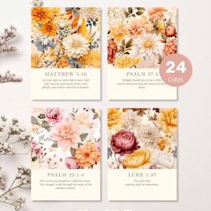 May include: Four printable scripture cards with floral designs in shades of orange, yellow, and pink. Each card features a Bible verse and the book and chapter. The cards are labeled "Floral Fall Printable Scripture Cards."