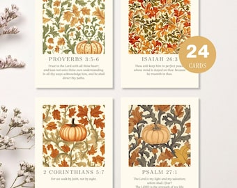 May include: Set of four autumn-themed printable scripture cards. Each card features a pumpkin illustration and a Bible verse. The cards have a floral design with orange, green, and brown leaves. The text "Autumn Floral Printable Scripture Cards" is at the bottom.