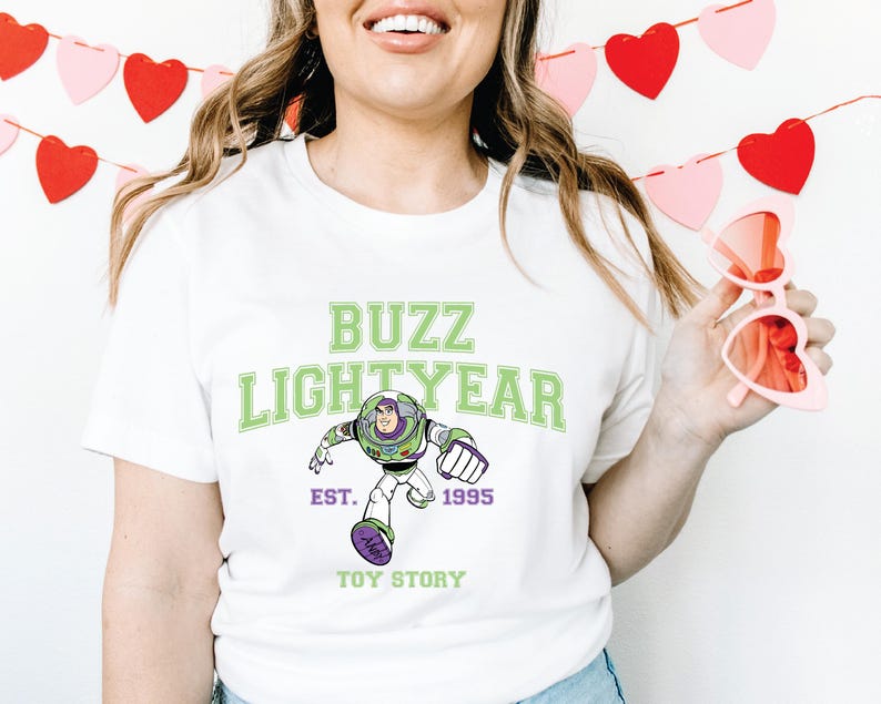 a woman wearing a buzz lightyear t - shirt