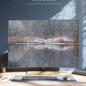 May include: A twin-screen 2-pack wallpaper set displayed on two stacked monitors. The top screen shows a snowy forest landscape with trees and a river, while the bottom screen displays a dark, reflective water surface mirroring the forest scene.