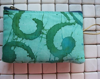 padded zipper pouch in teal swirl print batik fabric