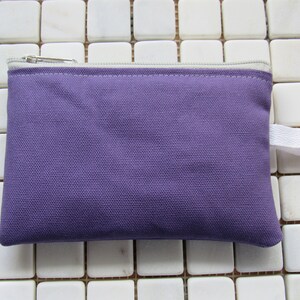 padded zipper pouch in purple duck canvas