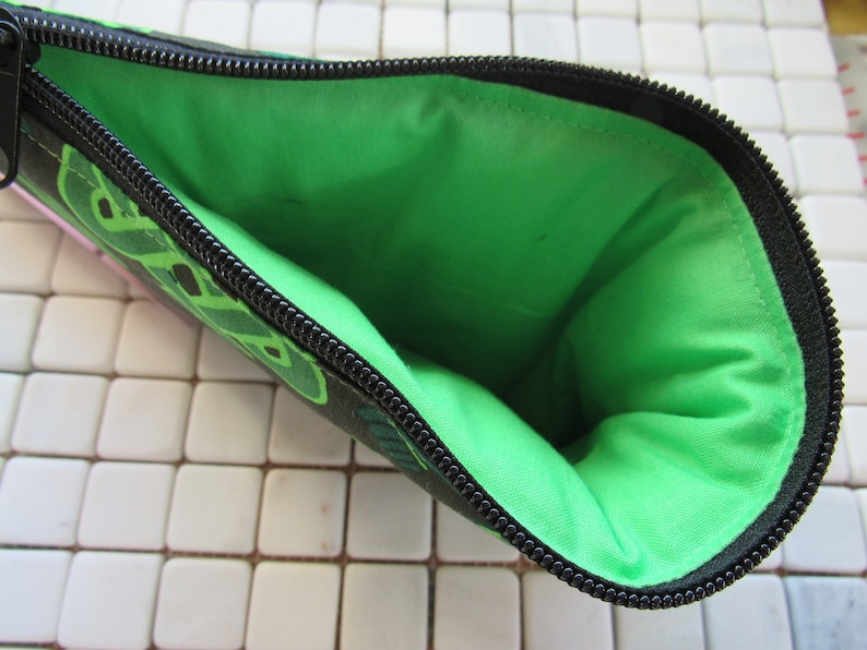 black and green celtic knot padded zipper bag