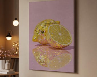 May include: A canvas print featuring a lemon and a lemon half, both with a mosaic tile design. The lemons are yellow and gold, set against a pink background. The image has a reflective surface.