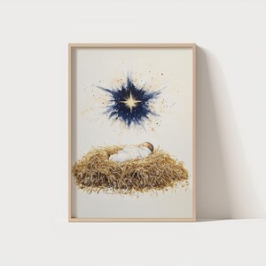 May include: A watercolor painting of a baby sleeping in a manger with a bright star shining above. The baby is wrapped in white cloth and is lying on a bed of straw. The star is surrounded by a blue and gold halo.