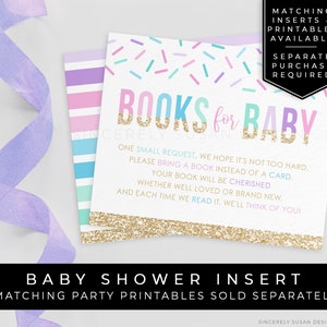 May include: A baby shower insert card with a gold glitter background and the text "Books for Baby". The card has a light blue, pink, and green striped background with sprinkles. The text on the card reads: "One small request, we hope it's not too hard, please bring a book instead of a card. Your book will be cherished whether well loved or brand new, and each time we read it, we'll think of you!"