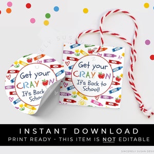 May include: A printable back to school tag with a red apple and crayons. The tag says "Get your Crayon It's Back to School!"