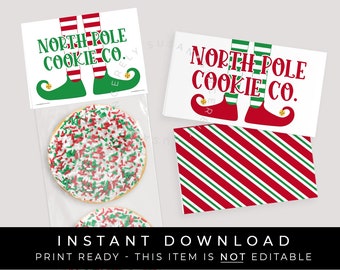 Pode incluir: Etiquetas de presente imprimíveis "North Pole Cookie Co." com pernas de duende e fundo listrado vermelho e verde. As etiquetas estão prontas para imprimir e não são editáveis.