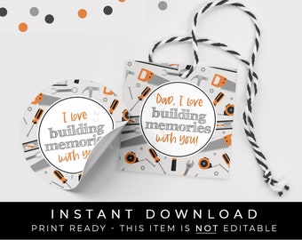 May include: Two printable gift tags with a gray and orange tool pattern. The text on the tags reads "Dad, I love building memories with you!" and "I love building memories with you!"