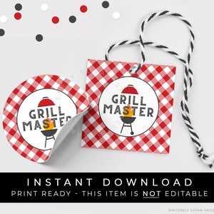 May include: Red and white gingham patterned gift tag with a white circle in the center. The circle has a red and black grill with flames and the text "Grill Master".